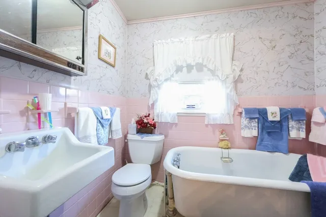 a room with furniture and a wooden floor