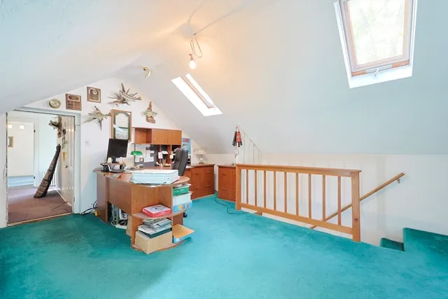 a bedroom with furniture and wooden floor