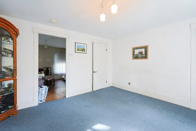 a view of a storage & utility room with closet window