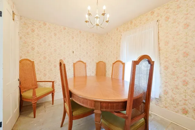 a bathroom with a sink a shower and a mirror