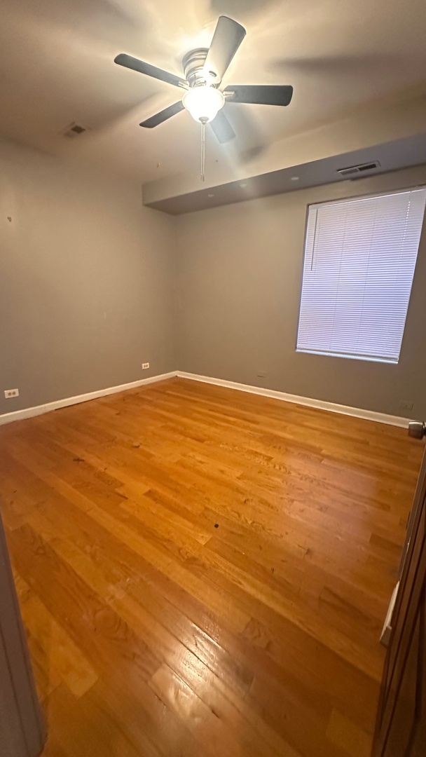 6714 South Chappel Avenue, Unit 2 Chicago, IL 60649 - Photo 6 of 10 view of an empty room