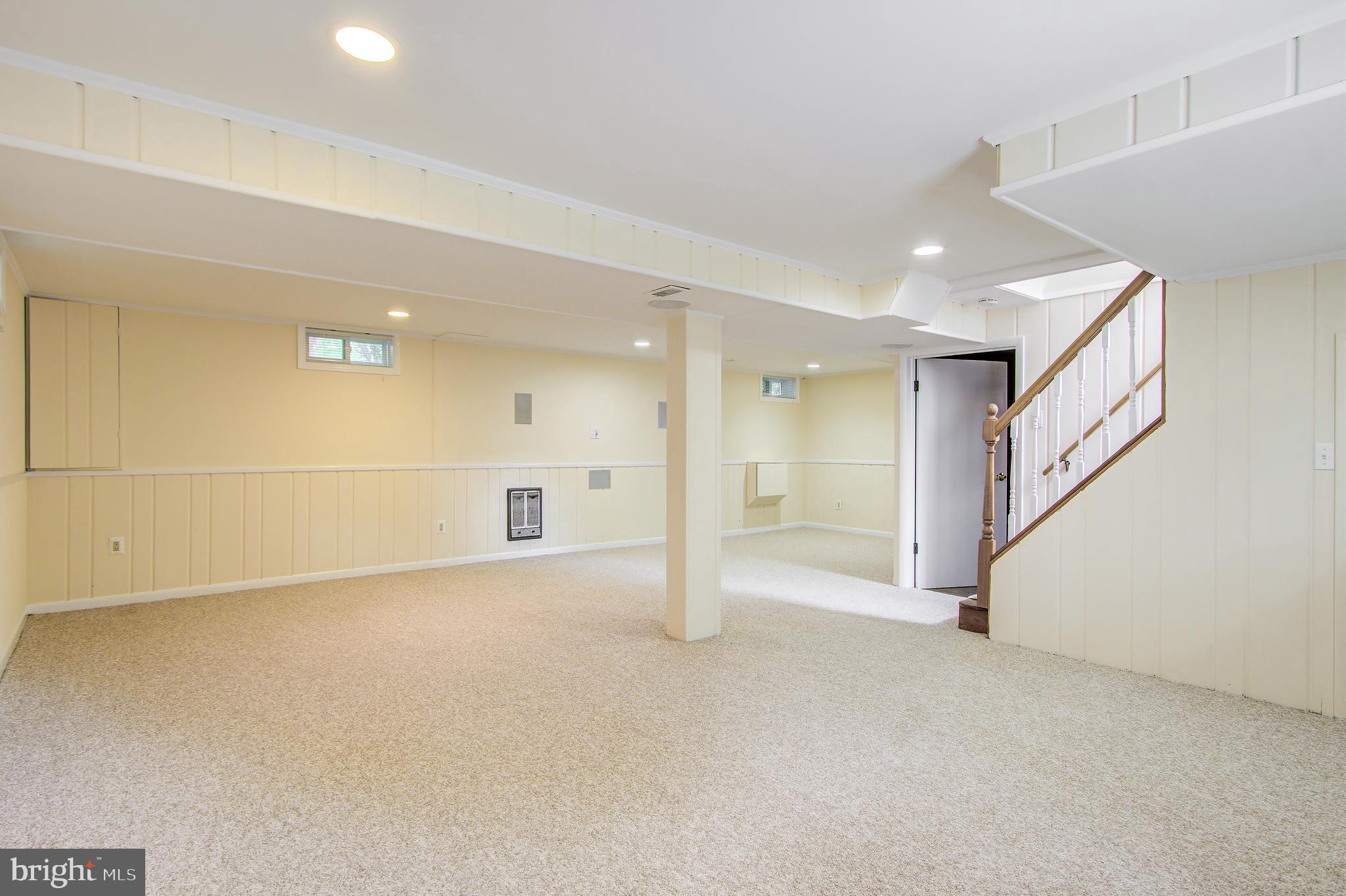 5814 Walton Road Bethesda, MD 20817 - Photo 22 of 29 rec room opens to patio and fenced yard
