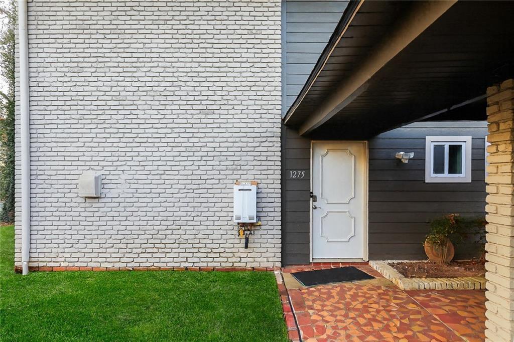 1277 Goodwin Road Northeast, Unit 1275 Atlanta, GA 30324 - Photo 2 of 19 a view of outdoor space and yard
