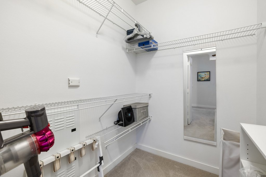 1900 Barton Springs Road, Unit 5009 Austin, TX 78704 - Photo 23 of 35 Functional closet space offers wire shelving systems for organized storage solutions.