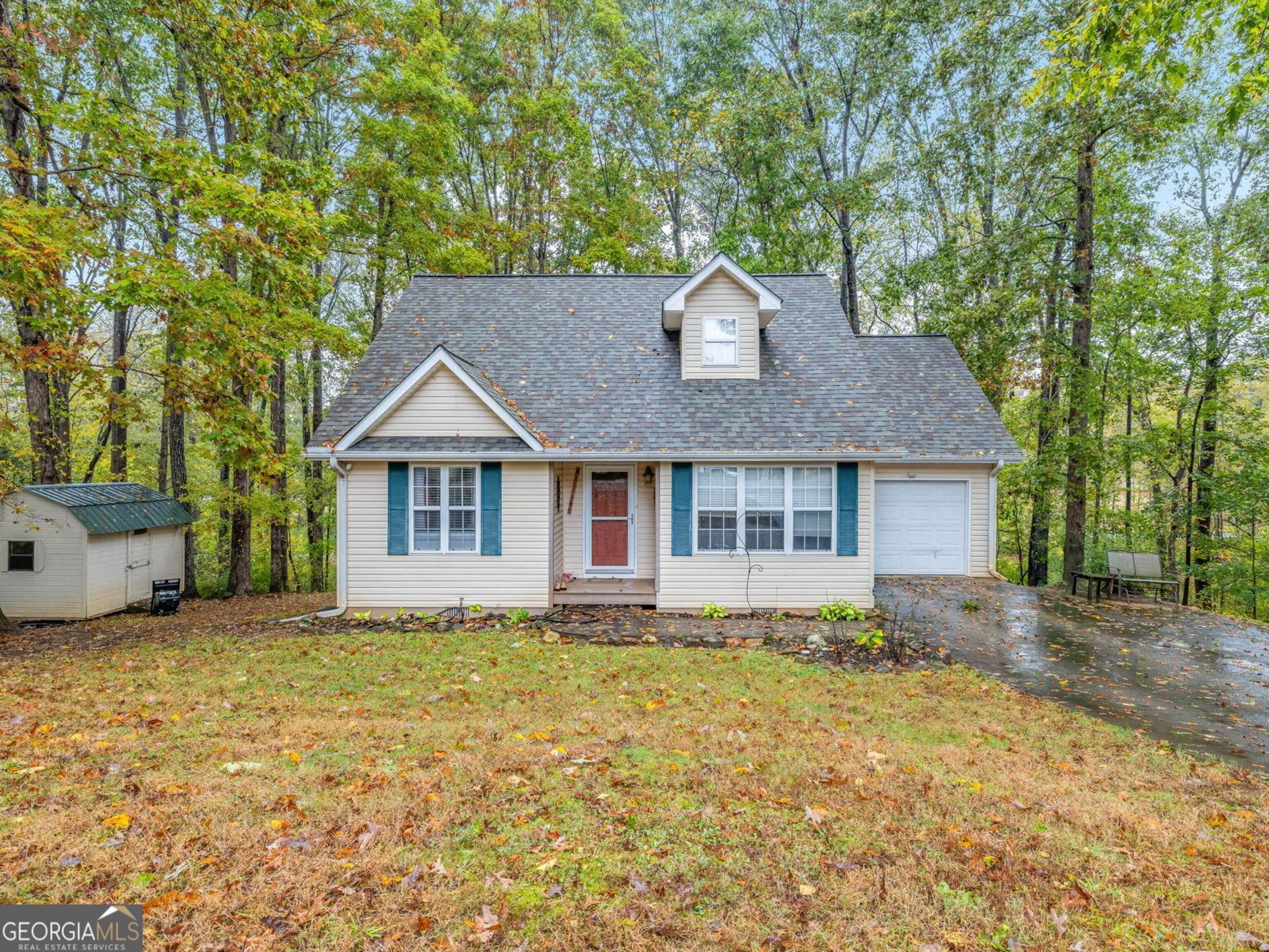 190 Sunset Oaks Drive Cornelia, GA 30531 - Photo 1 of 20 a front view of a house with a yard