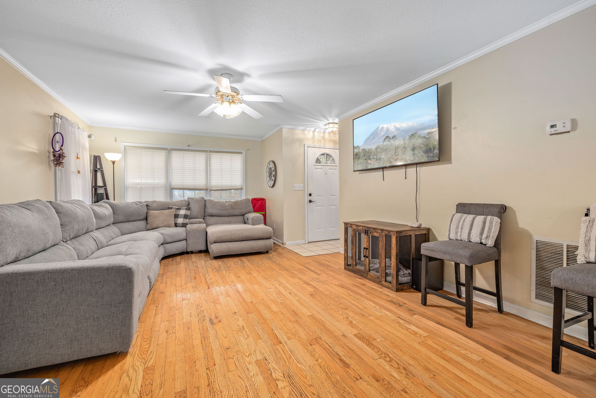 190 Sunset Oaks Drive Cornelia, GA 30531 - Photo 4 of 20 a living room with furniture and a wooden floor