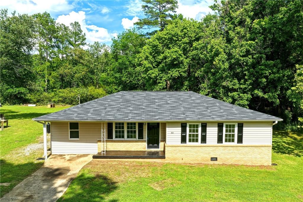 300 Cash Town Road Aragon, GA 30104 - Photo 1 of 28 front view of a house with a yard