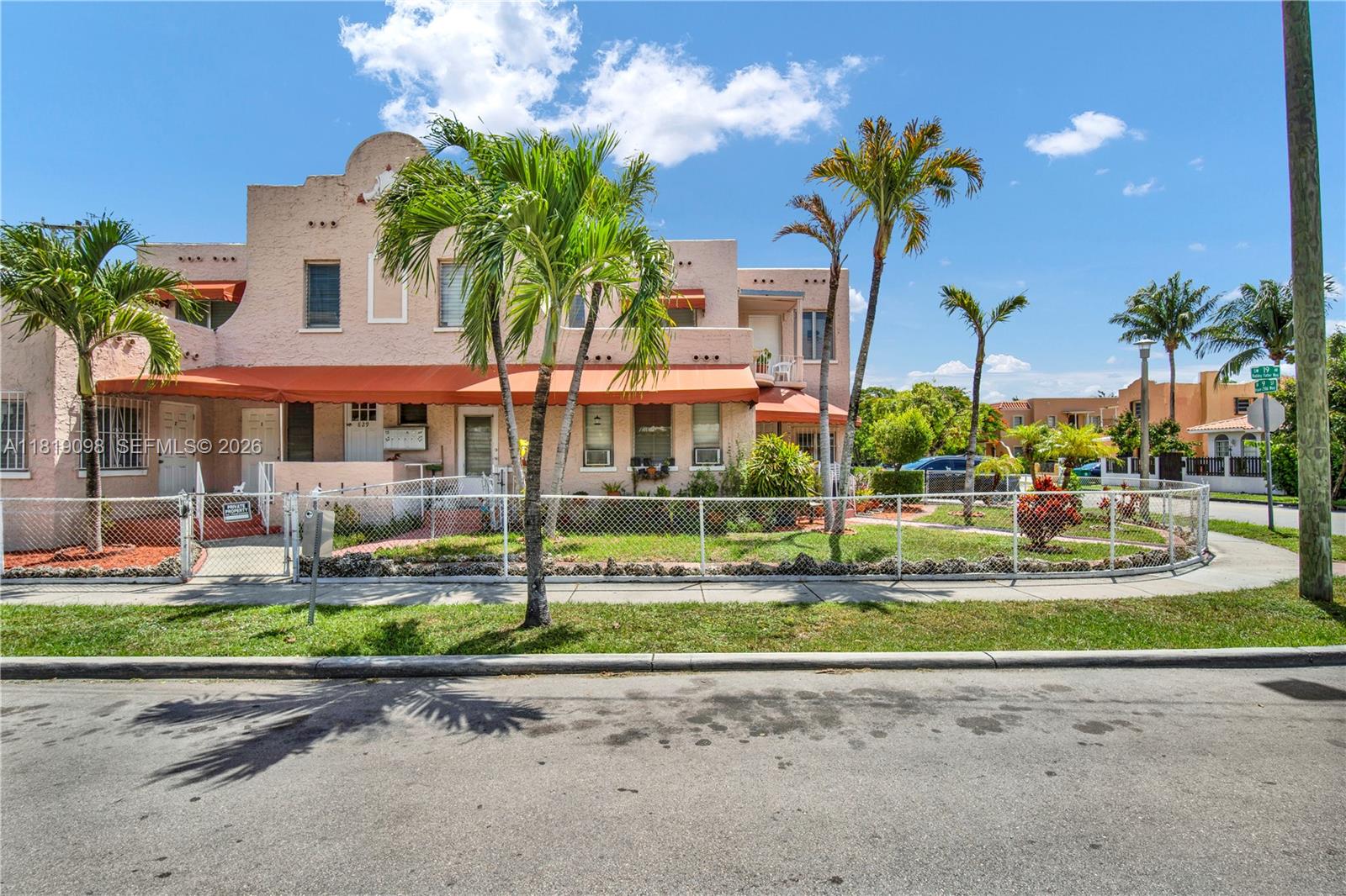 829 Southwest 19th Avenue Miami, FL 33135 - Photo 15 of 54 a front view of a house with swimming pool yard and outdoor seating