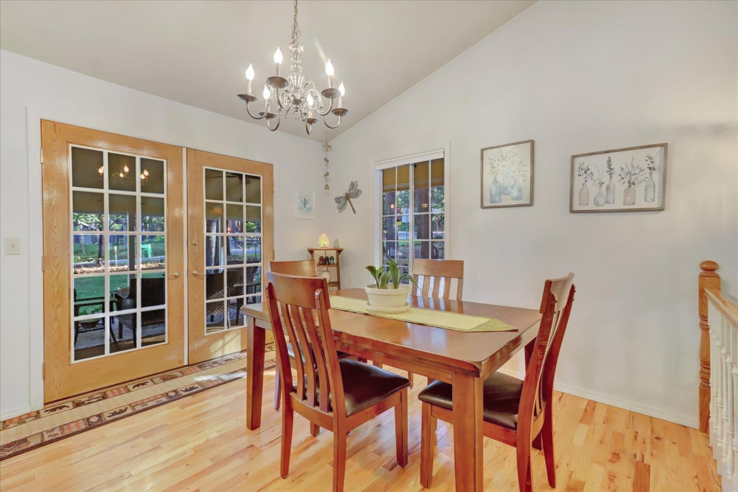 12746 Quaker Hill Cross Road Nevada City, CA 95959 - Photo 11 of 99 a view of a dining room with furniture window and outside view