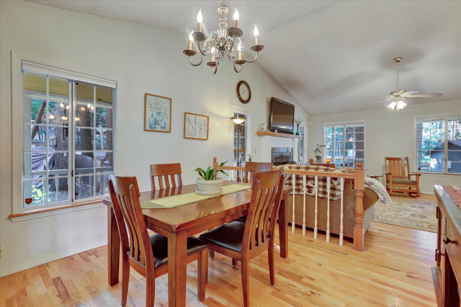 12746 Quaker Hill Cross Road Nevada City, CA 95959 - Photo 19 of 99 a view of a dining room with furniture and wooden floor