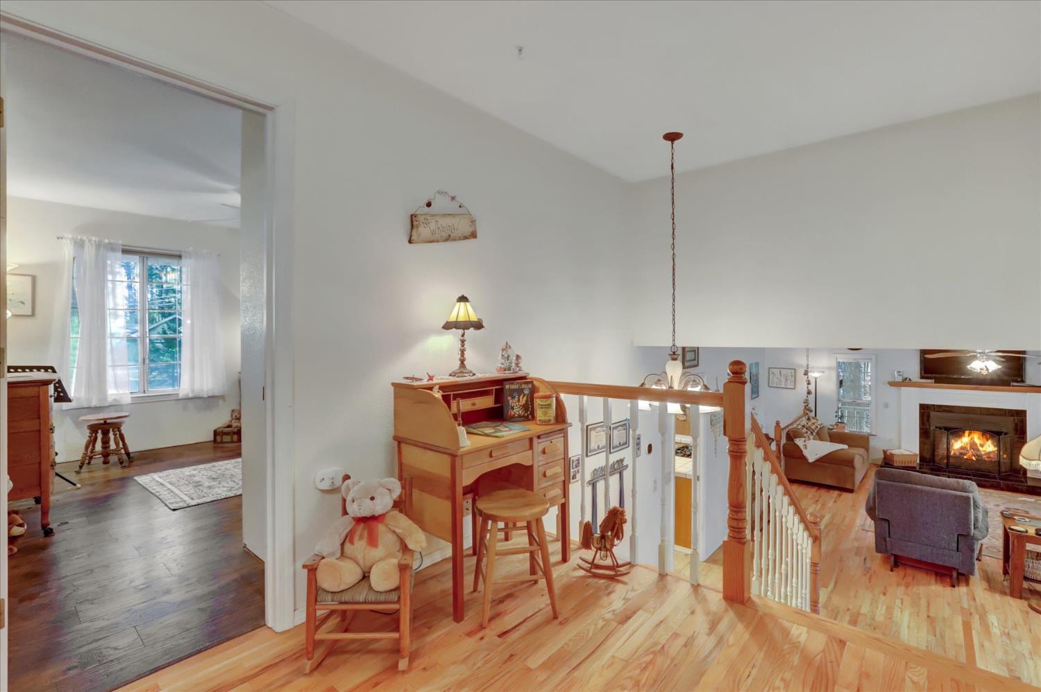 12746 Quaker Hill Cross Road Nevada City, CA 95959 - Photo 34 of 99 a view of a dining room with furniture and wooden floor