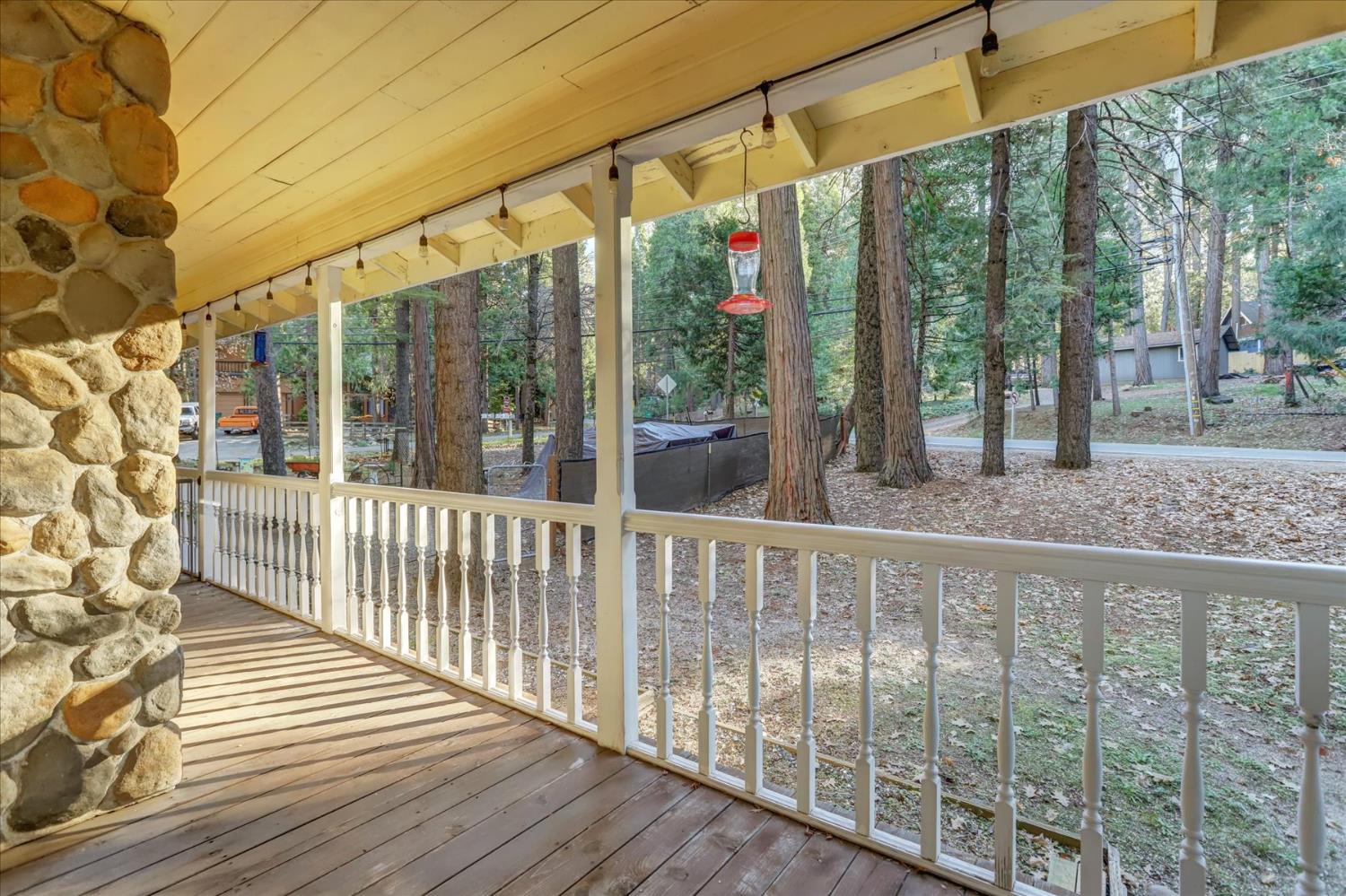 12746 Quaker Hill Cross Road Nevada City, CA 95959 - Photo 56 of 99 a view of a porch with wooden floor and stairs