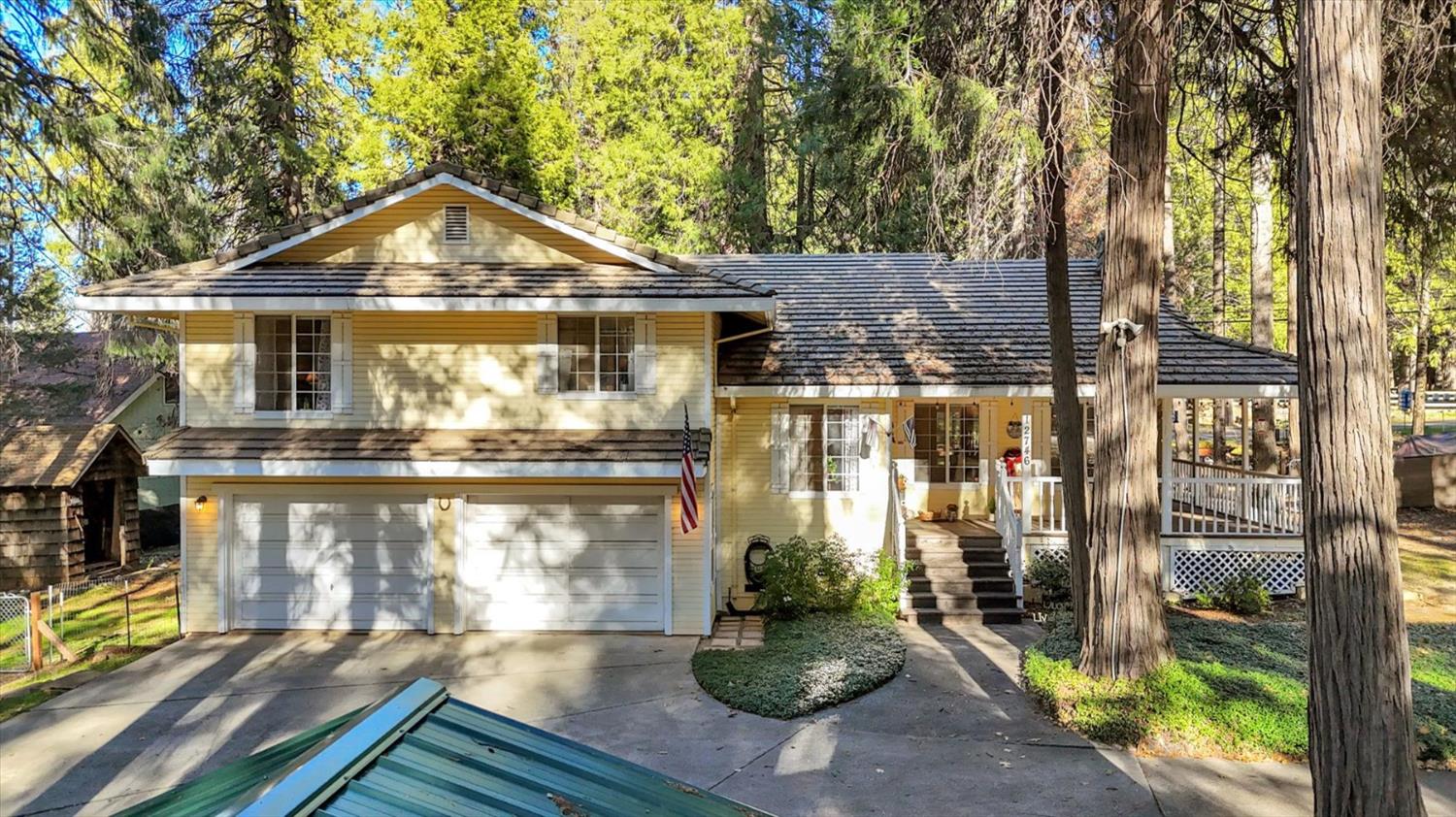 12746 Quaker Hill Cross Road Nevada City, CA 95959 - Photo 80 of 99 a front view of a house with a yard