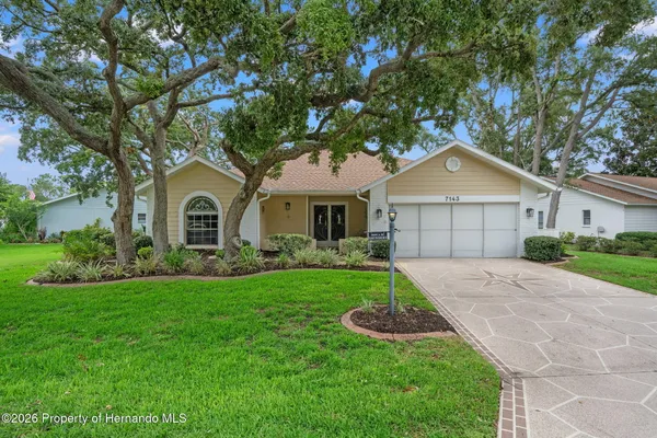 $395,000 | 7143 Crown Oaks Drive, Spring Hill, FL 34606