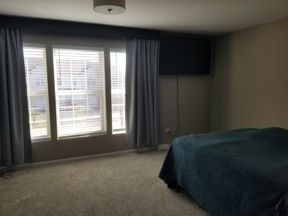 15322 Pinewood Road Lockport, IL 60441 - Photo 4 of 14 a bed sitting in a bedroom next to a window