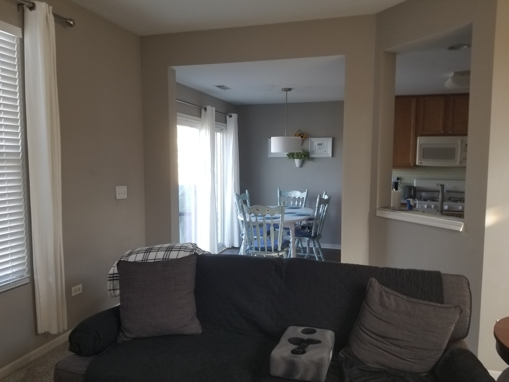 15322 Pinewood Road Lockport, IL 60441 - Photo 6 of 14 a living room with furniture and a window