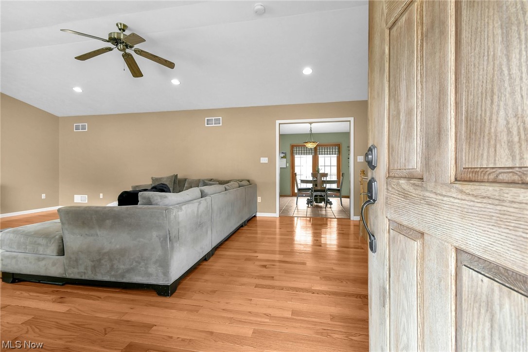 4900 Ellerman Road Zanesville, OH 43701 - Photo 5 of 28 Living room with light hardwood / wood-style floors and ceiling fan