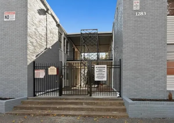 a view of a brick building with a window