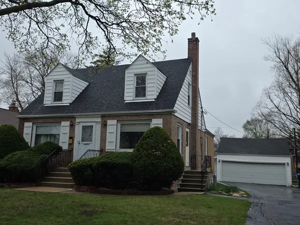 a front view of house with yard