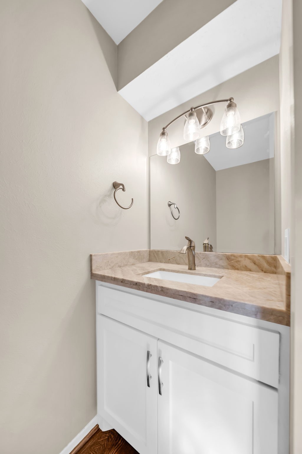 115 Heather Lane Conroe, TX 77385 - Photo 11 of 28 a bathroom with a granite countertop sink and a mirror