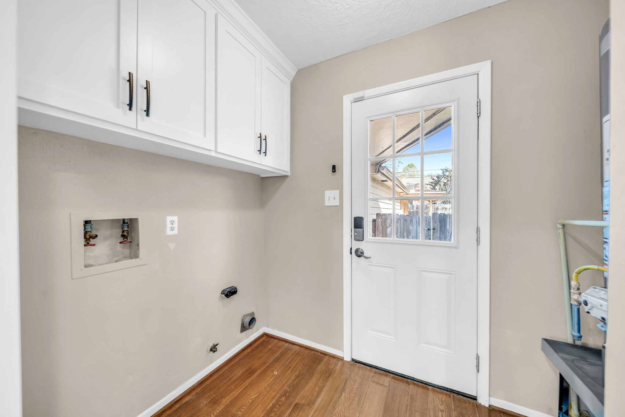 115 Heather Lane Conroe, TX 77385 - Photo 12 of 28 a view of empty room with wooden floor