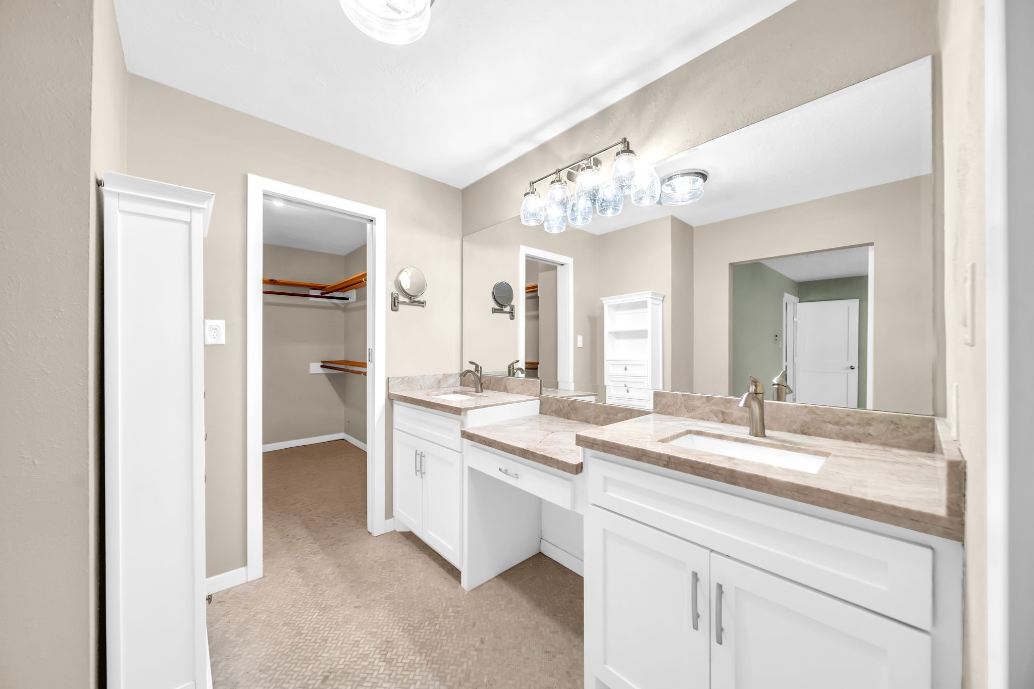 115 Heather Lane Conroe, TX 77385 - Photo 14 of 28 a bathroom with a granite countertop sink and a mirror