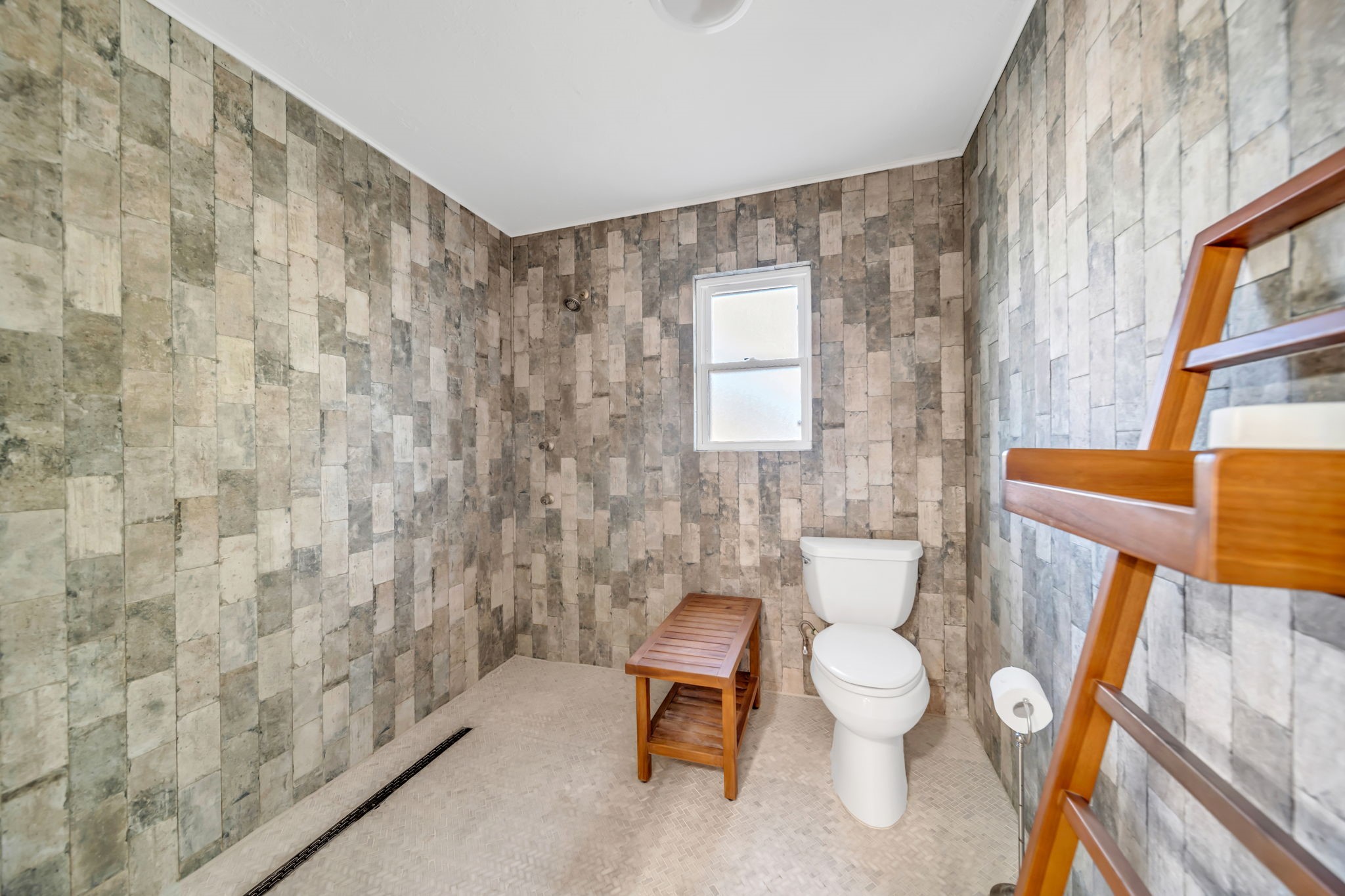 115 Heather Lane Conroe, TX 77385 - Photo 15 of 28 a bathroom with a toilet and a shower