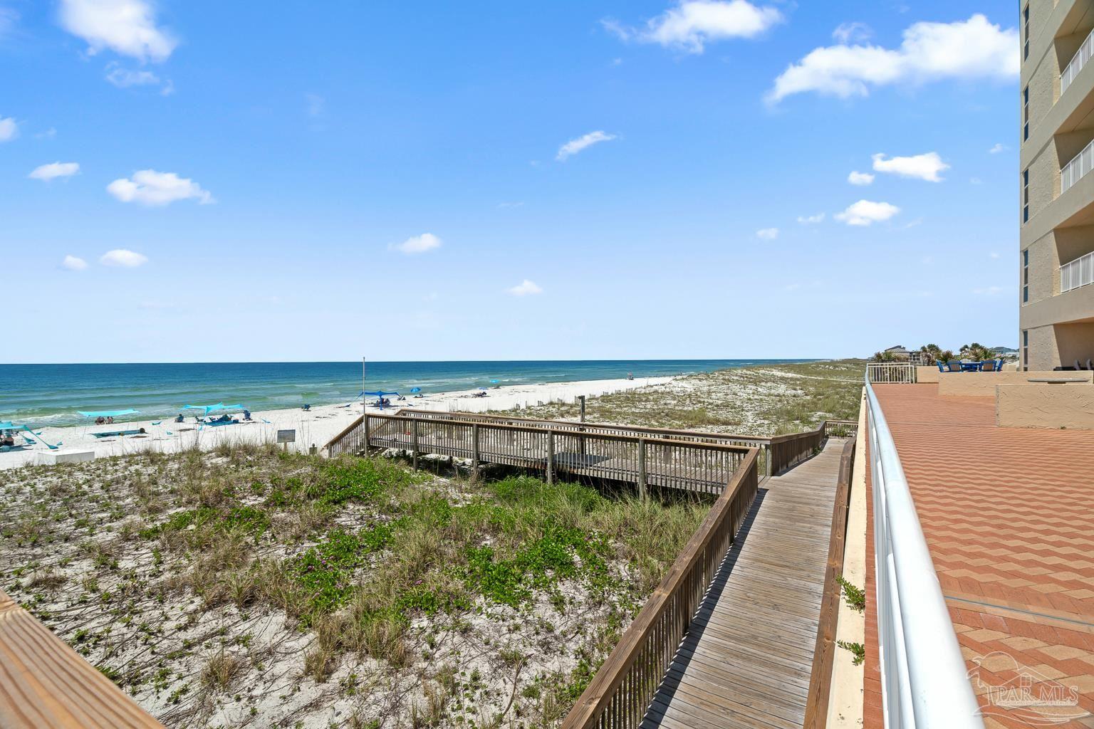 999 Fort Pickens Road, Unit 204 Pensacola Beach, FL 32561 - Photo 37 of 48 a view of roof with wooden floor and city view