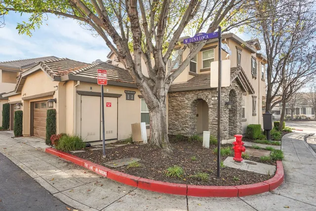 a front view of a house with entertaining space