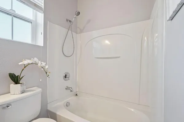 a bathroom with a white tub