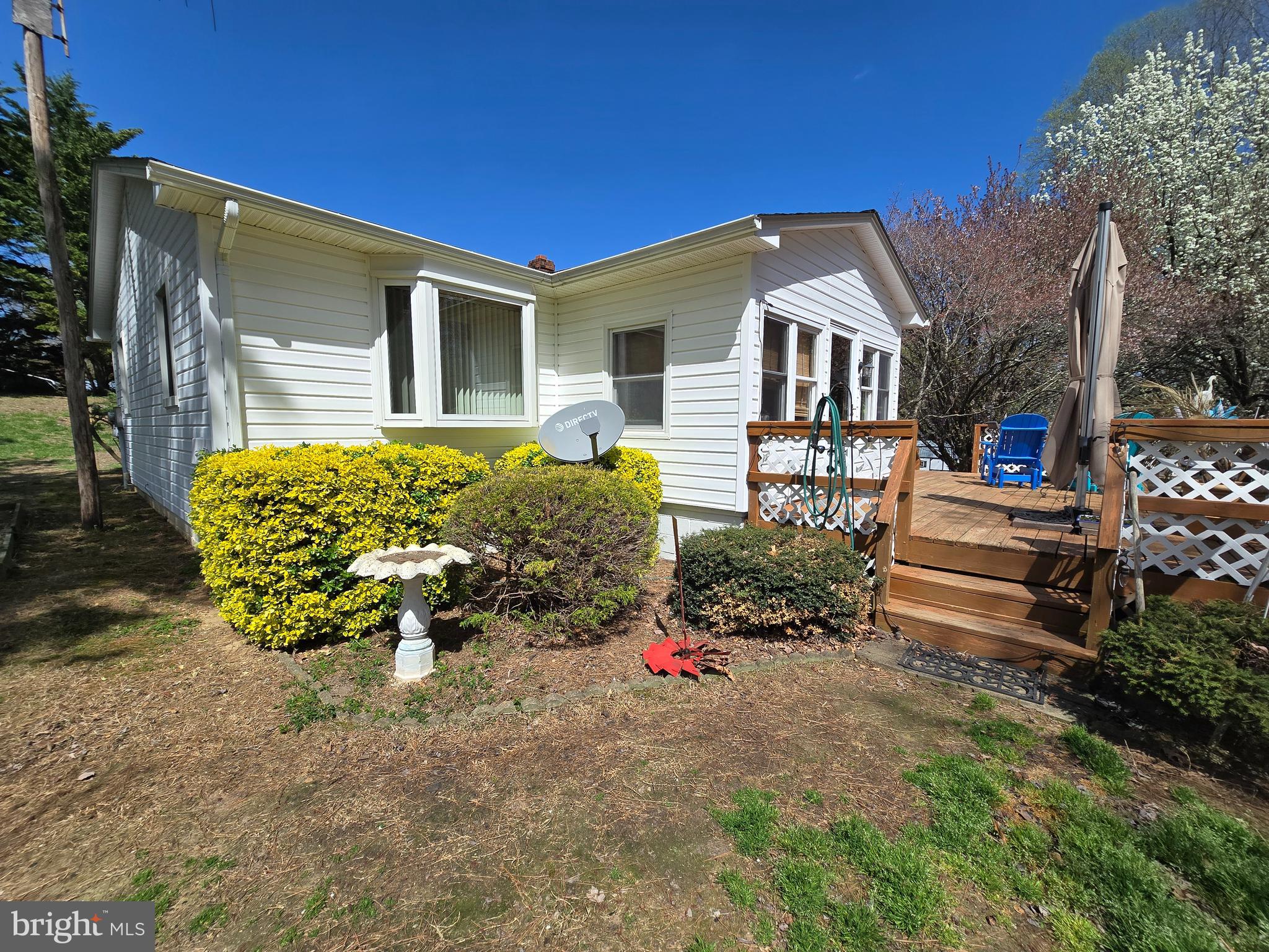 18631 Cherryfield Road Drayden, MD 20630 - Photo 1 of 45 a front view of a house with a yard