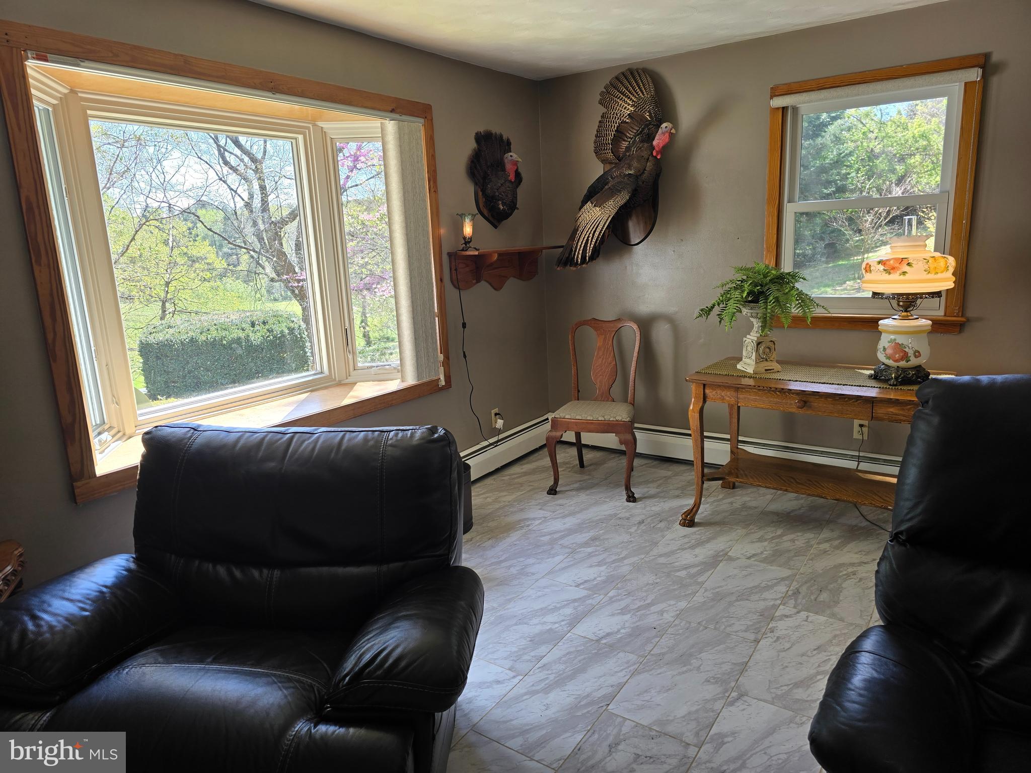 18631 Cherryfield Road Drayden, MD 20630 - Photo 12 of 45 a living room with furniture and a window