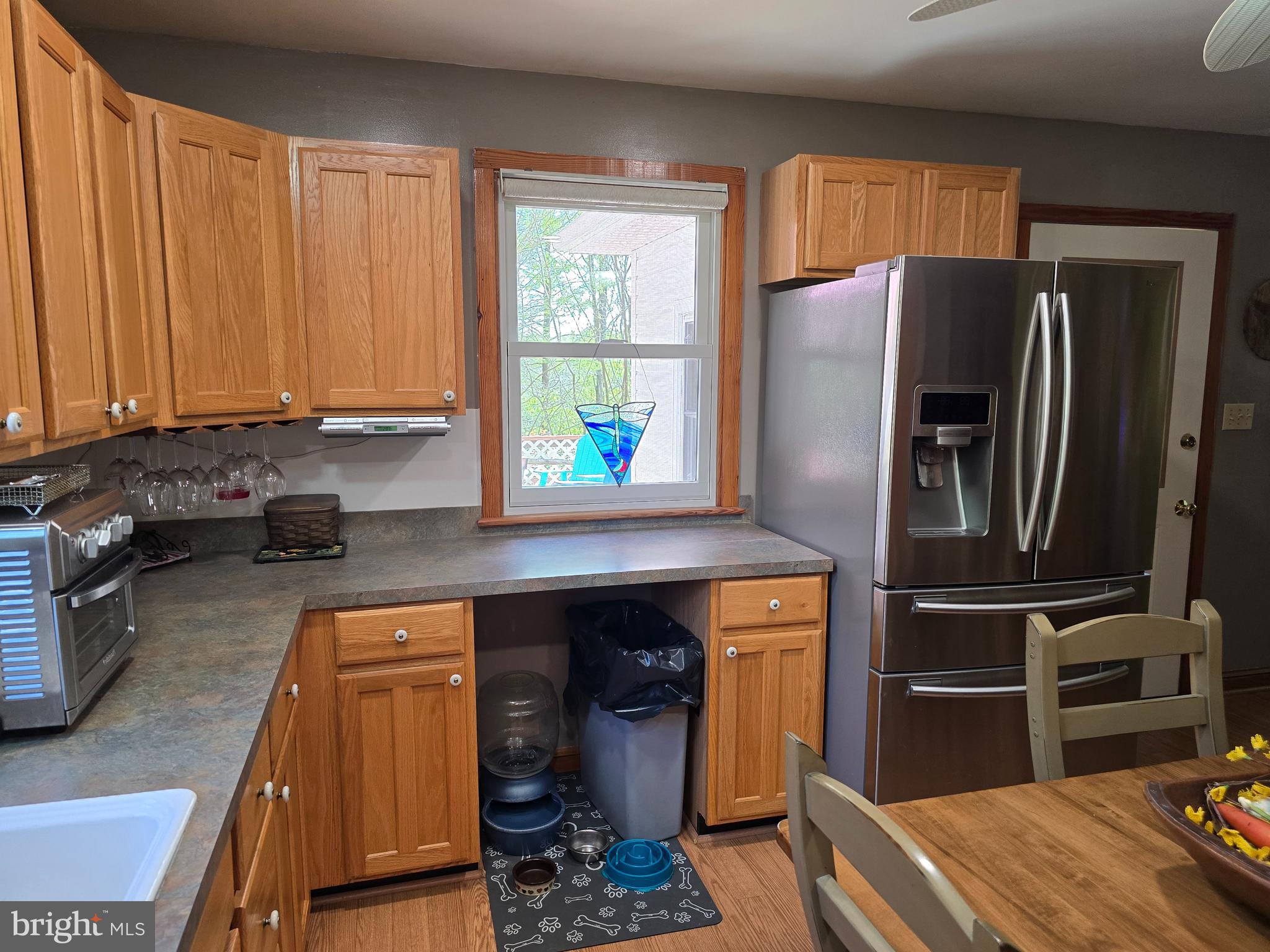 18631 Cherryfield Road Drayden, MD 20630 - Photo 15 of 45 a kitchen with a refrigerator and window