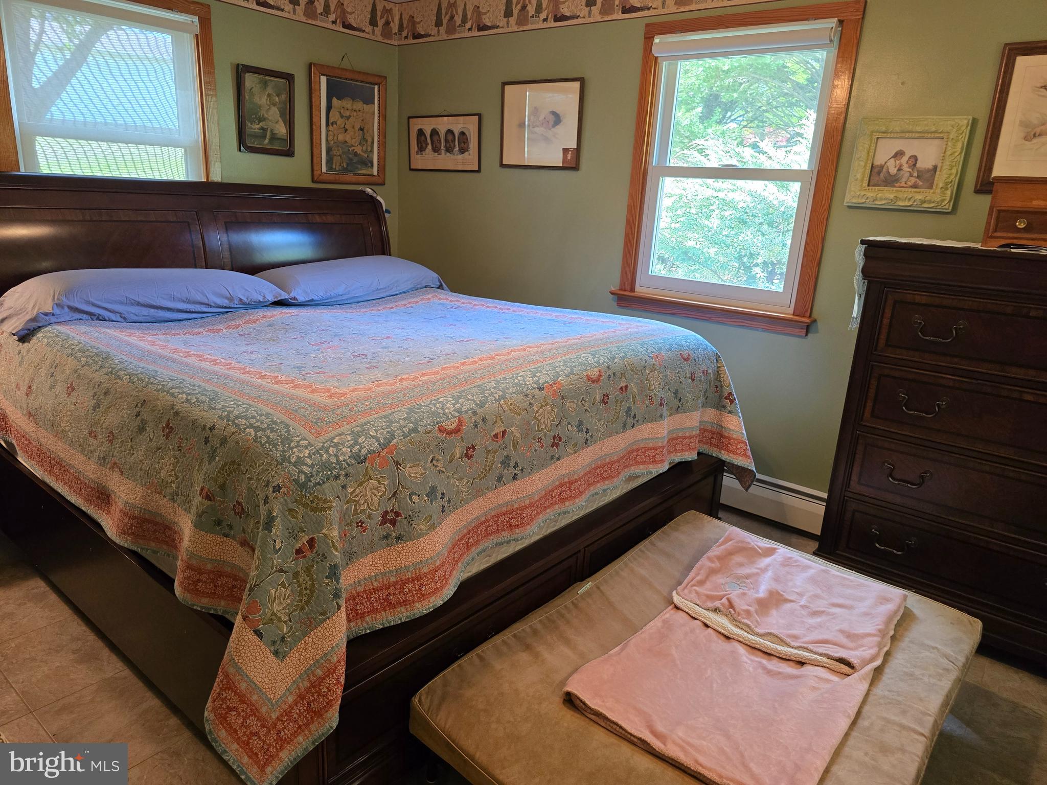 18631 Cherryfield Road Drayden, MD 20630 - Photo 19 of 45 a bed sitting in a bedroom next to a window