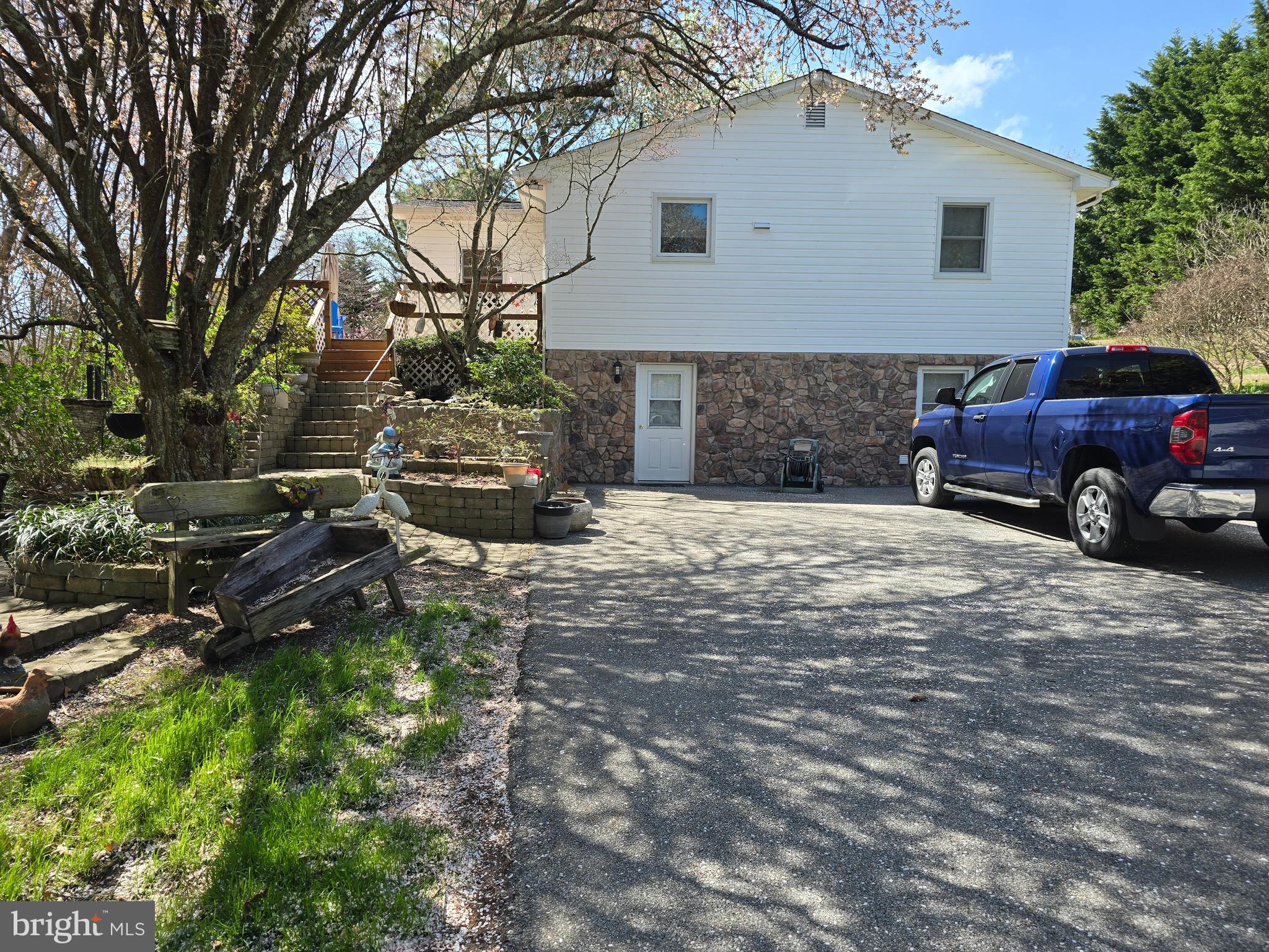 18631 Cherryfield Road Drayden, MD 20630 - Photo 2 of 45 a view of a car in front of a white house