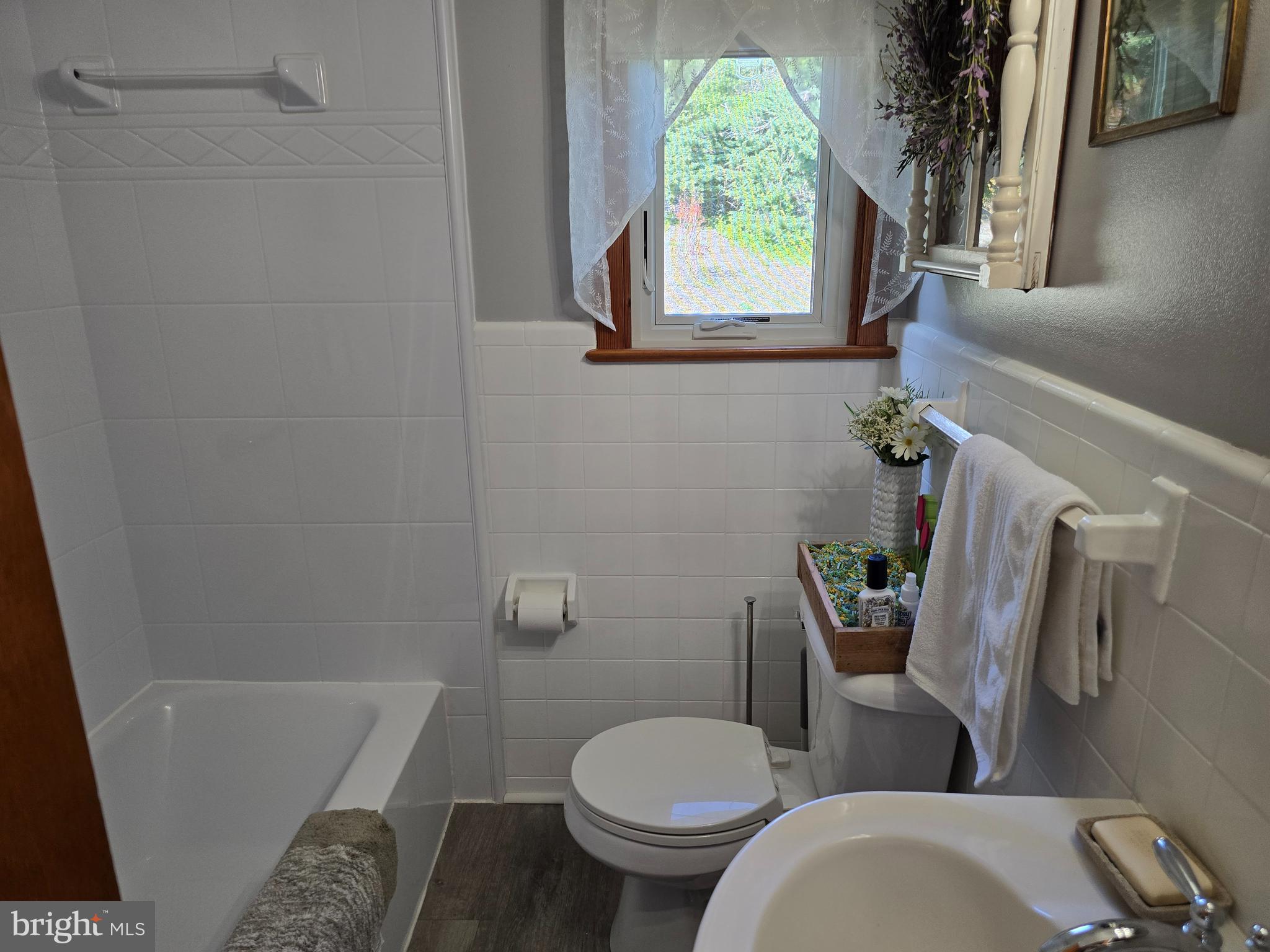 18631 Cherryfield Road Drayden, MD 20630 - Photo 26 of 45 a bathroom with a toilet and a shower