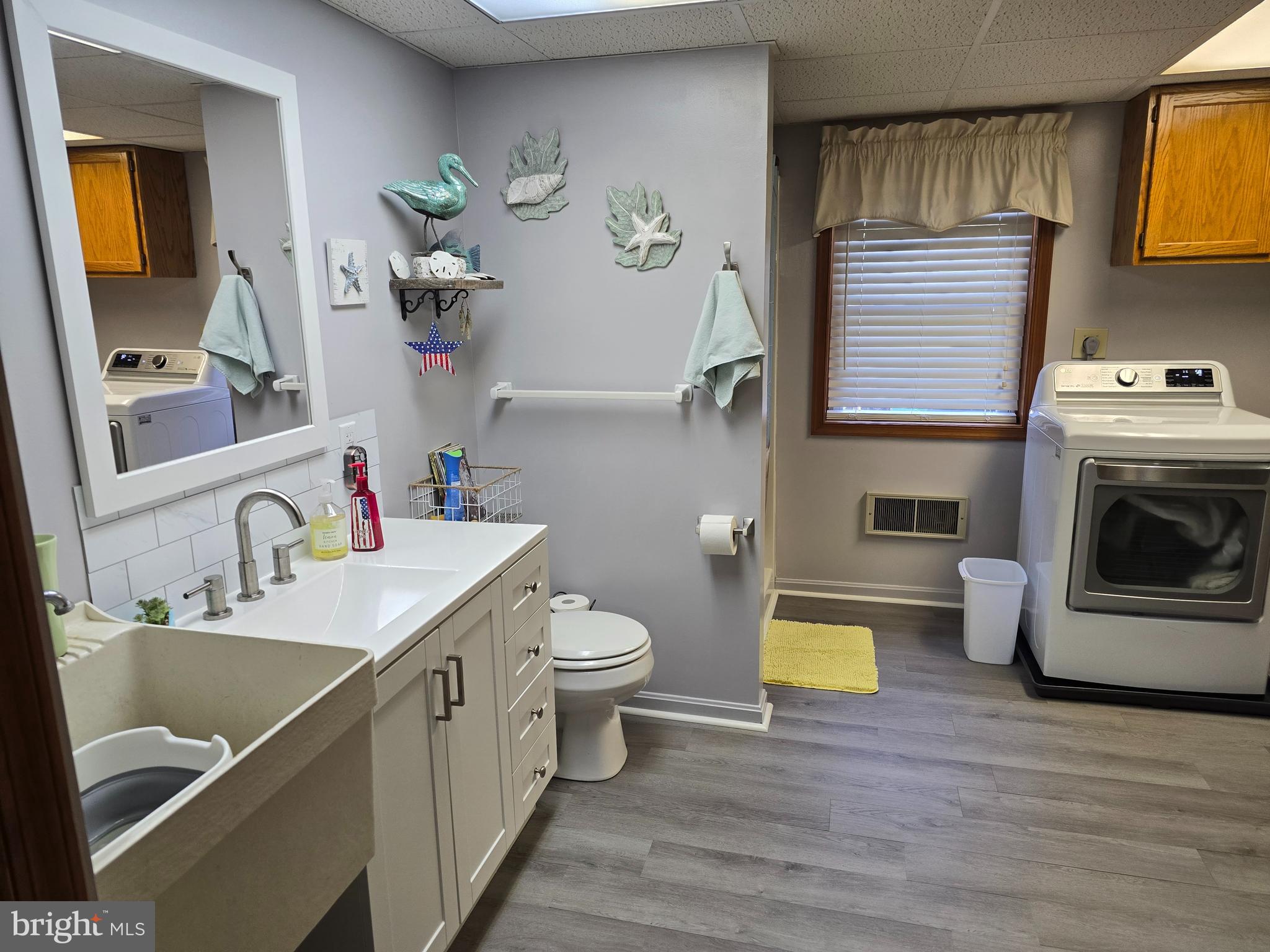 18631 Cherryfield Road Drayden, MD 20630 - Photo 30 of 45 a bathroom with a sink vanity granite and toilet