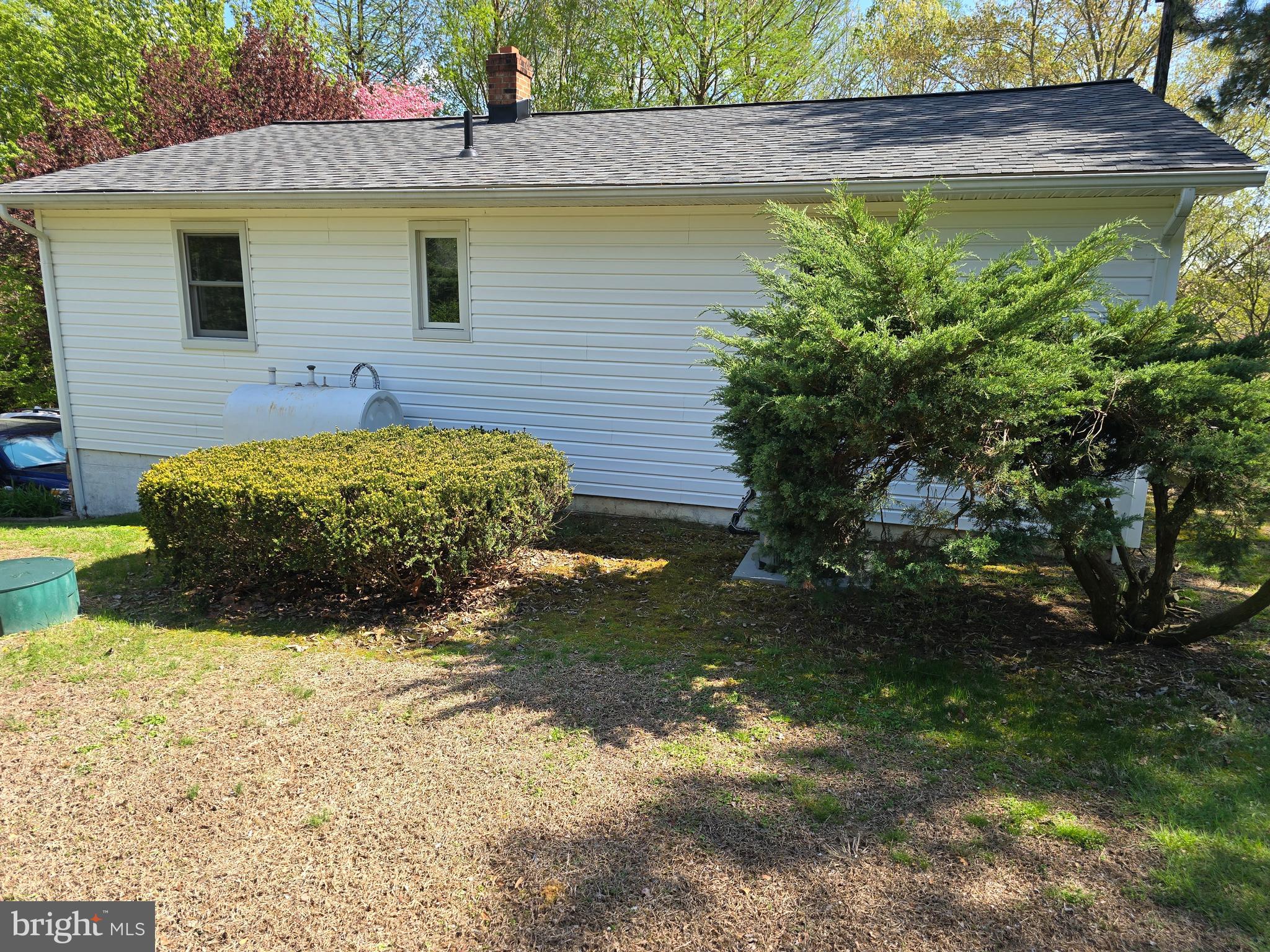 18631 Cherryfield Road Drayden, MD 20630 - Photo 40 of 45 a front view of a house with garden