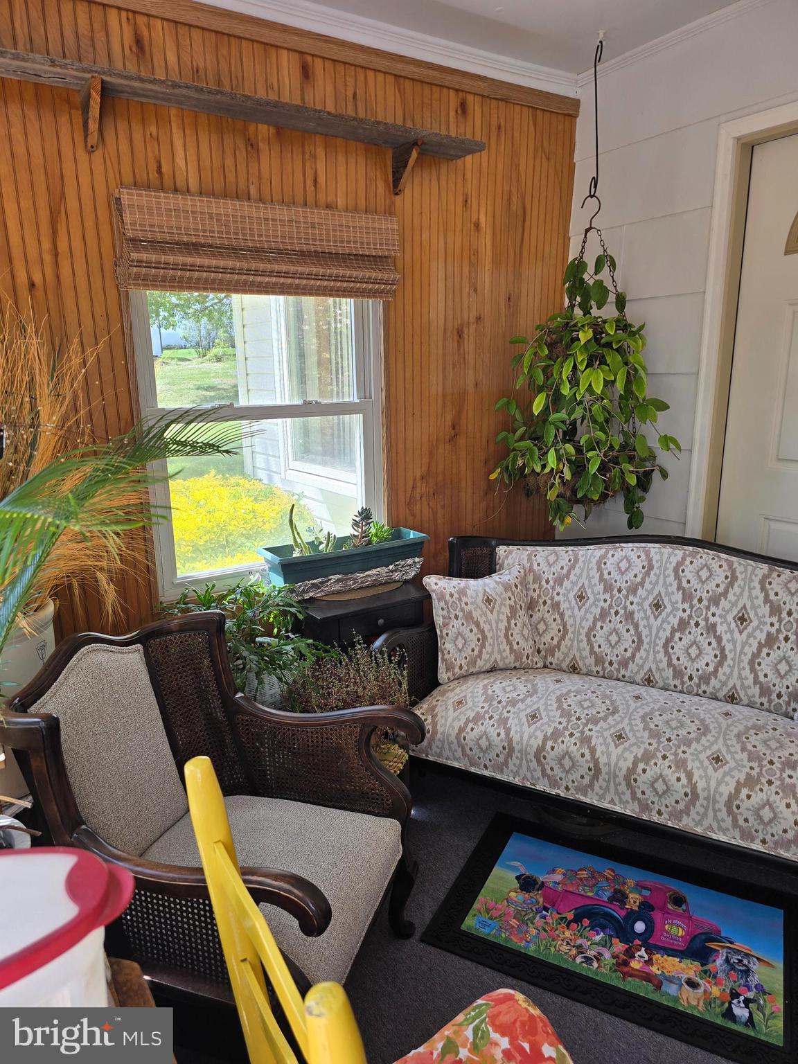 18631 Cherryfield Road Drayden, MD 20630 - Photo 5 of 45 a living room with furniture and a potted plant