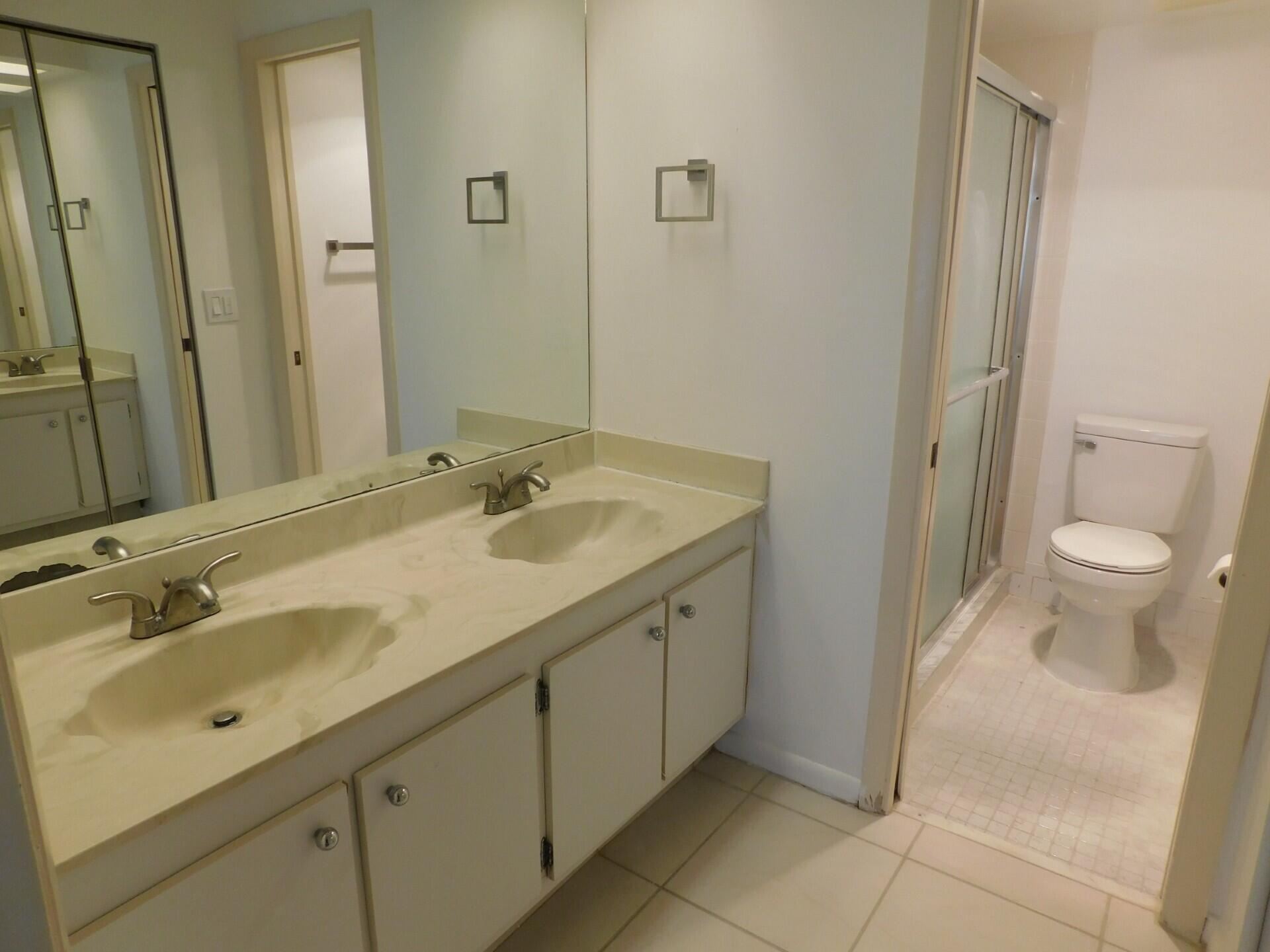 6768 10th Avenue North, Unit 113 Lake Worth, FL 33467 - Photo 20 of 65 Owners Bathroom