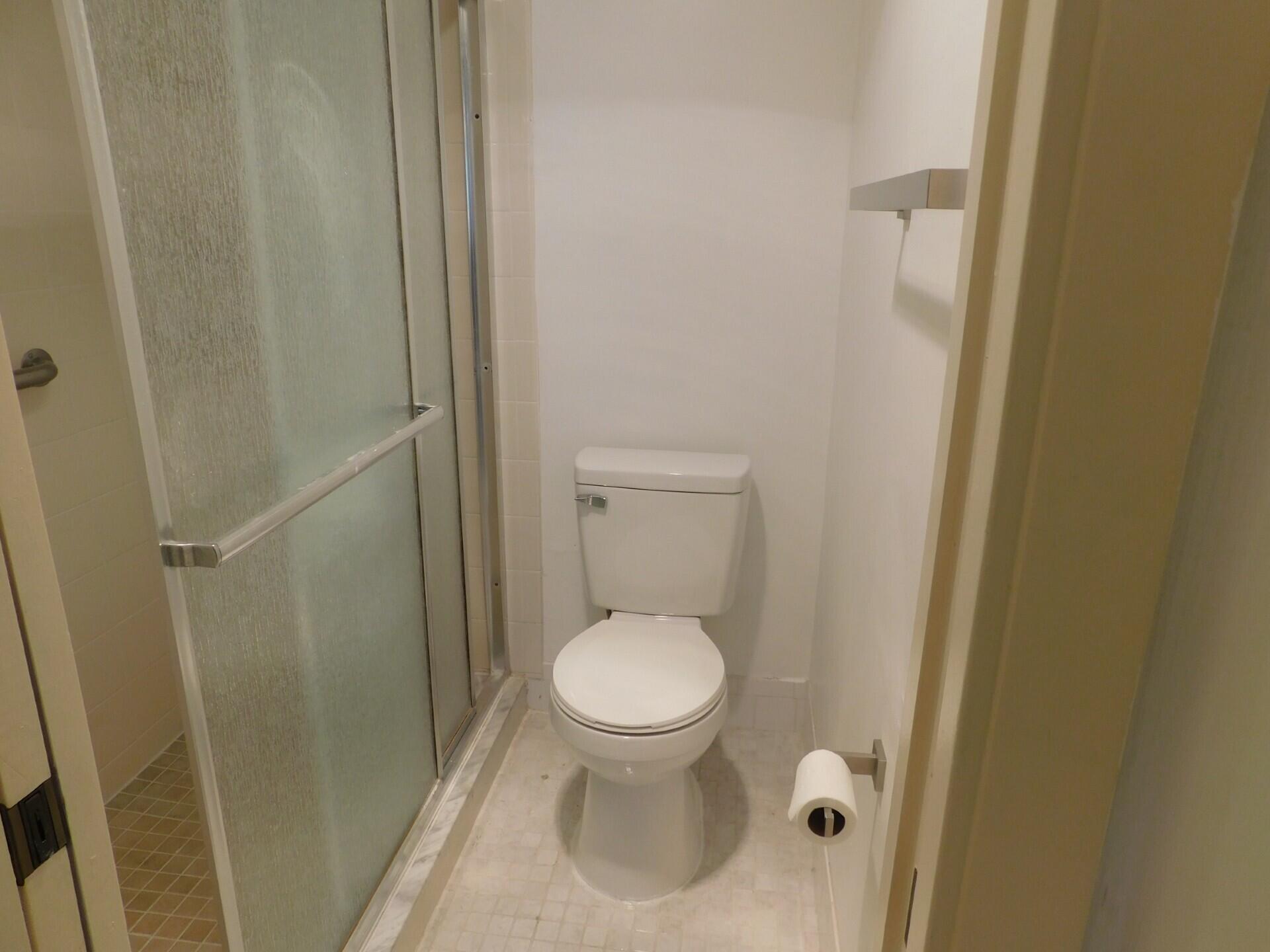 6768 10th Avenue North, Unit 113 Lake Worth, FL 33467 - Photo 21 of 65 Owners Bathroom