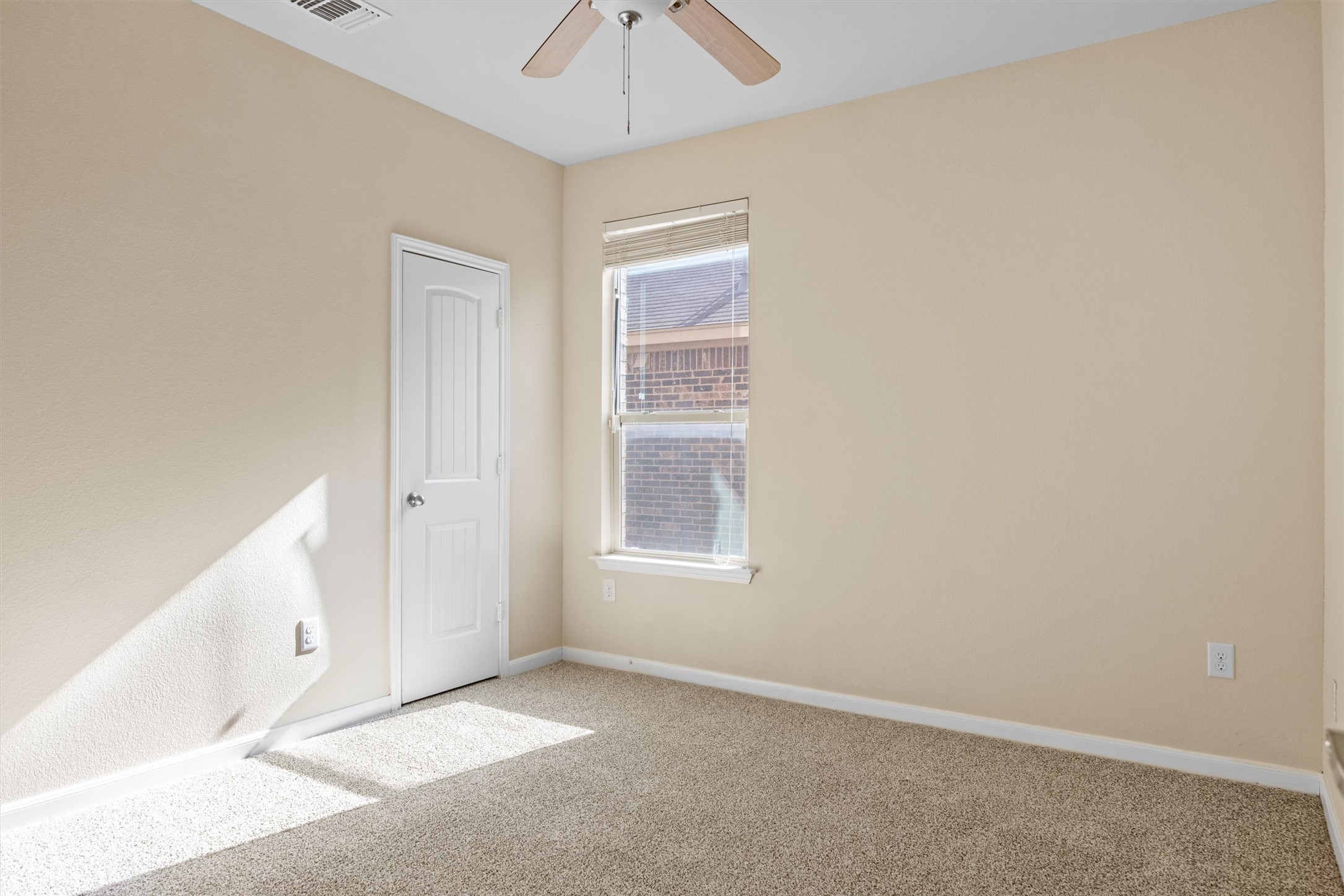 18120 Moreto Loop Pflugerville, TX 78660 - Photo 13 of 28 Guest Room or Home Office on main level with new carpet & fan