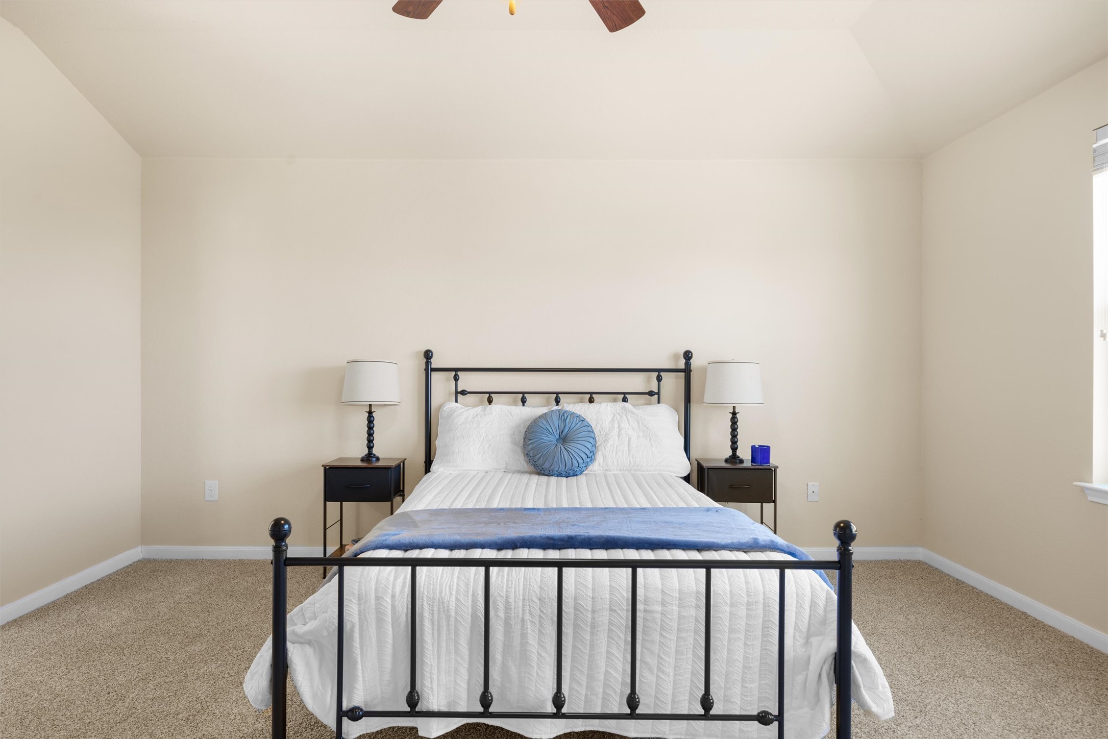 18120 Moreto Loop Pflugerville, TX 78660 - Photo 19 of 28 Owners #39; suite with new carpet, ceiling fan, and vaulted ceiling