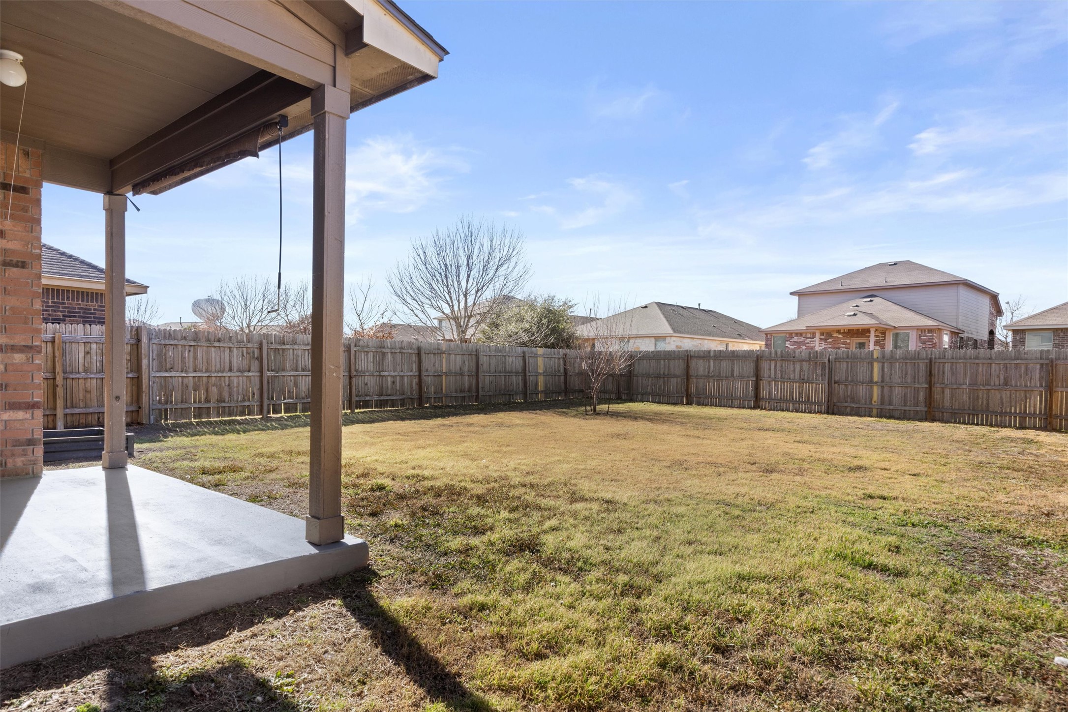 18120 Moreto Loop Pflugerville, TX 78660 - Photo 27 of 28 Fenced backyard featuring a patio area