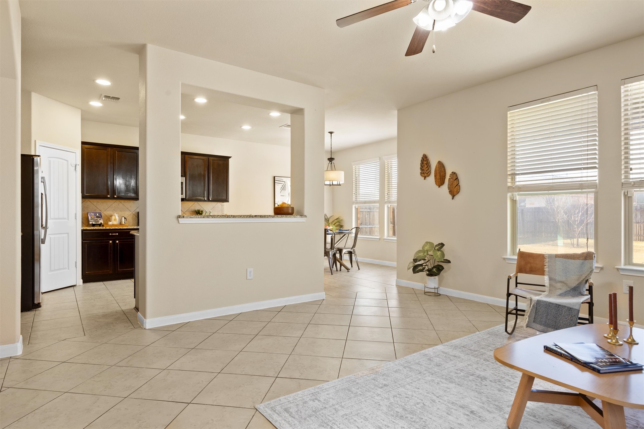 18120 Moreto Loop Pflugerville, TX 78660 - Photo 6 of 28 Living room with light tile-patterned flooring