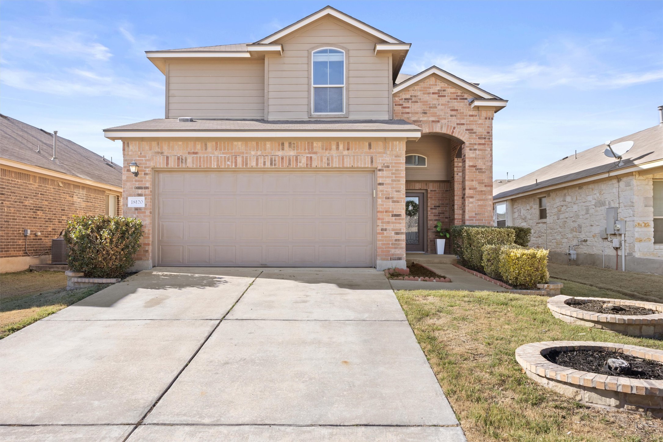 18120 Moreto Loop Pflugerville, TX 78660 - Photo 8 of 29 a front view of a house with entertaining space