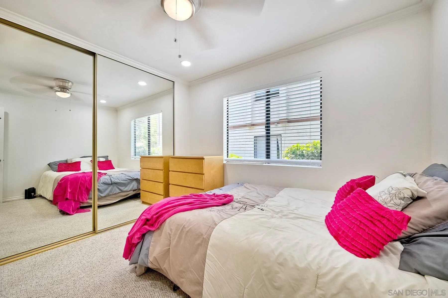 6358 Rancho Mission Road, Unit 623 San Diego, CA 92108 - Photo 11 of 21 a bedroom with a bed and window