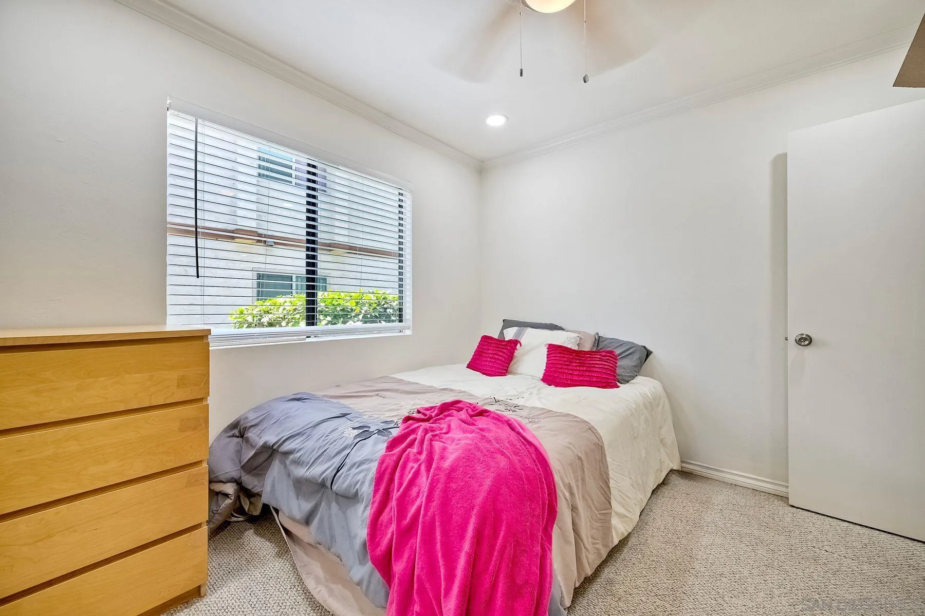 6358 Rancho Mission Road, Unit 623 San Diego, CA 92108 - Photo 12 of 21 a bedroom with a bed and a window