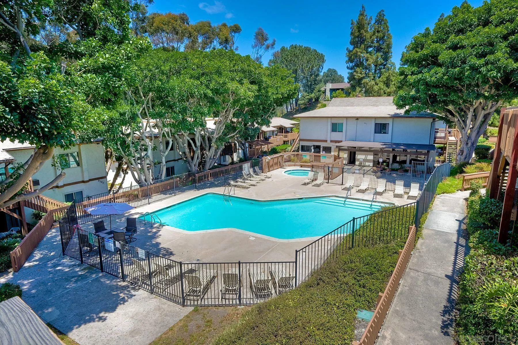 6358 Rancho Mission Road, Unit 623 San Diego, CA 92108 - Photo 13 of 21 an outdoor space with seating area and trees