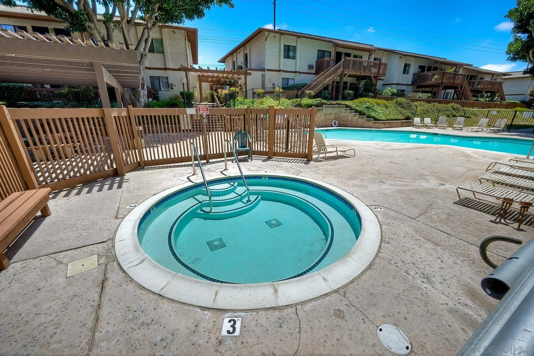 6358 Rancho Mission Road, Unit 623 San Diego, CA 92108 - Photo 15 of 21 a view of a swimming pool with a patio